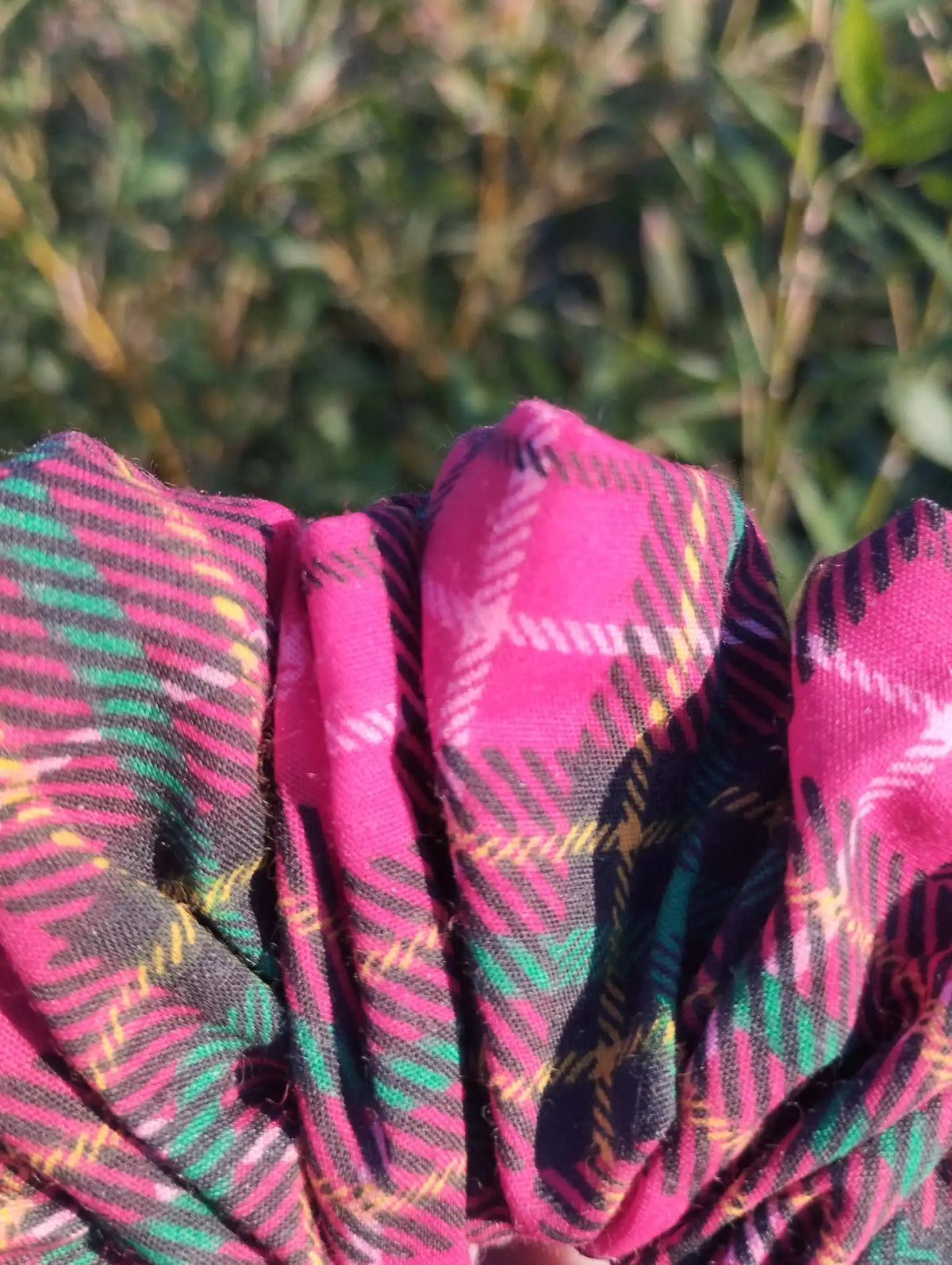Close-up of the fabric texture and pattern on Berry Tartan Jumbo Scrunchie