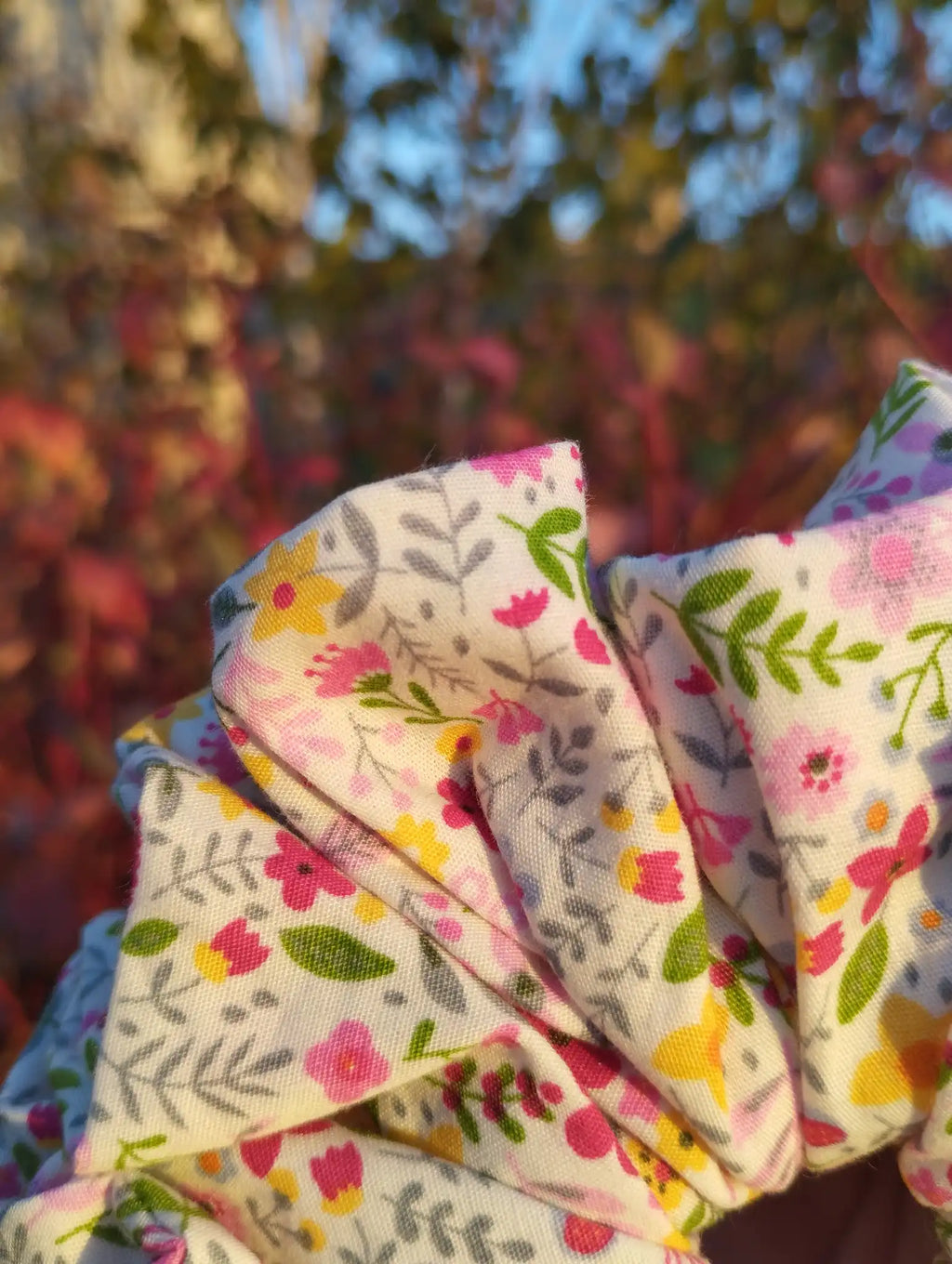 Close-up of the fabric texture and pattern on Blossom Meadow Jumbo Scrunchie