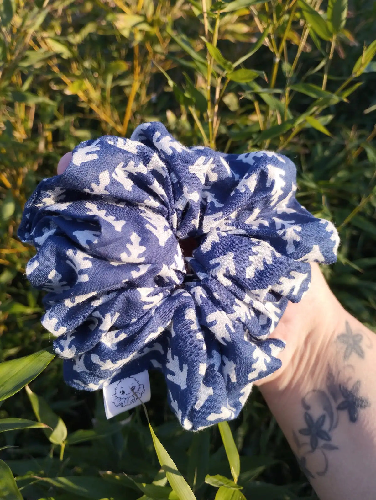 Blue Leaf Jumbo Scrunchie, front view showing the gathered shape