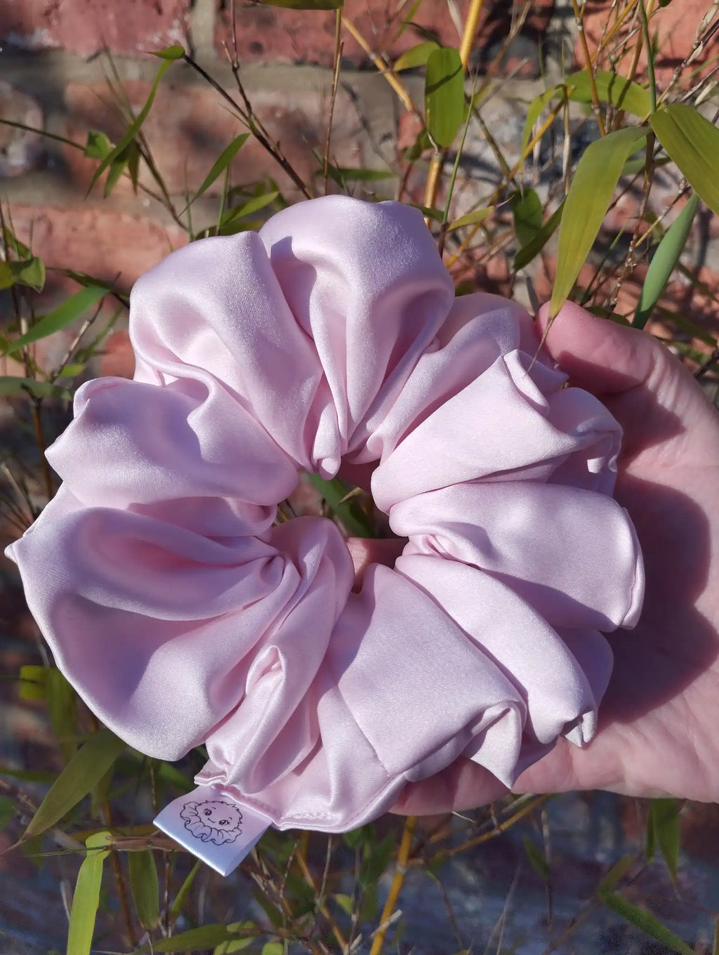 Blush Pink satin Jumbo scrunchie showing its full gathered shape