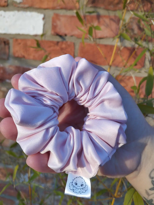 Blush Pink satin Medium scrunchie showing its gathered shape