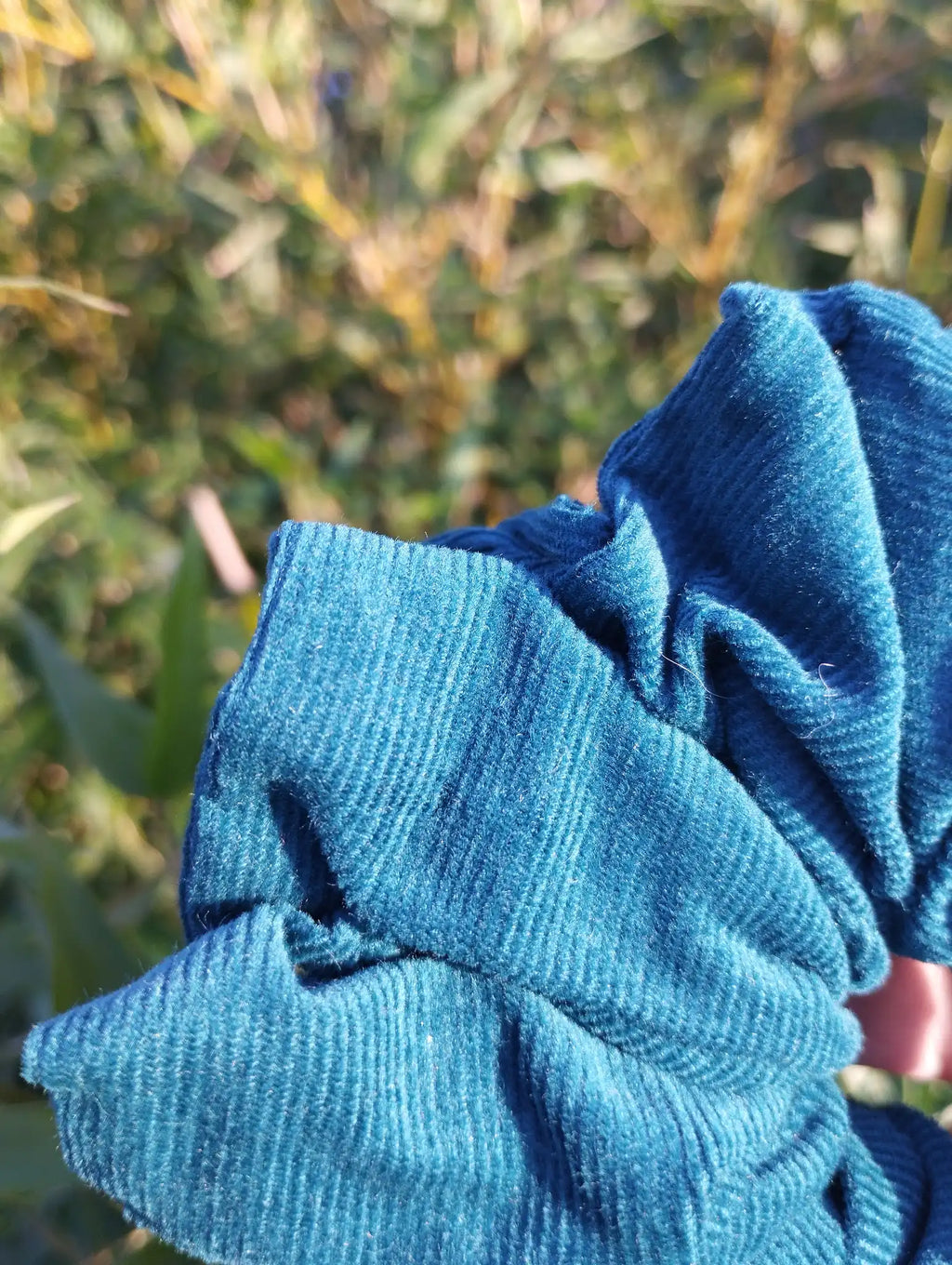 Close-up of the fabric texture and pattern on Deep Teal Jumbo Scrunchie
