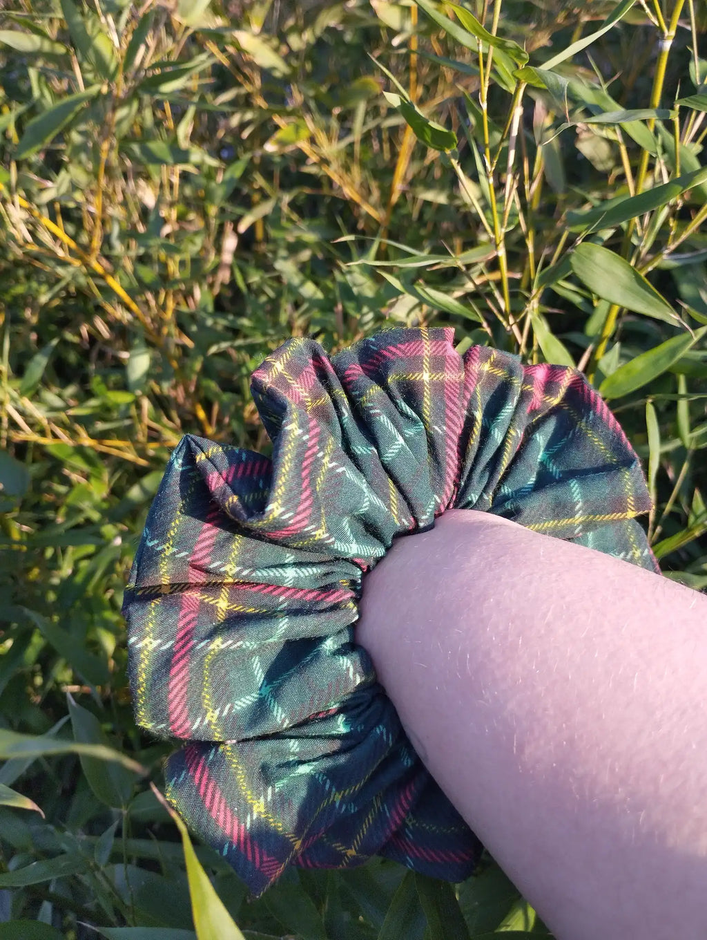 Forest Tartan Jumbo Scrunchie worn on a wrist to show its size