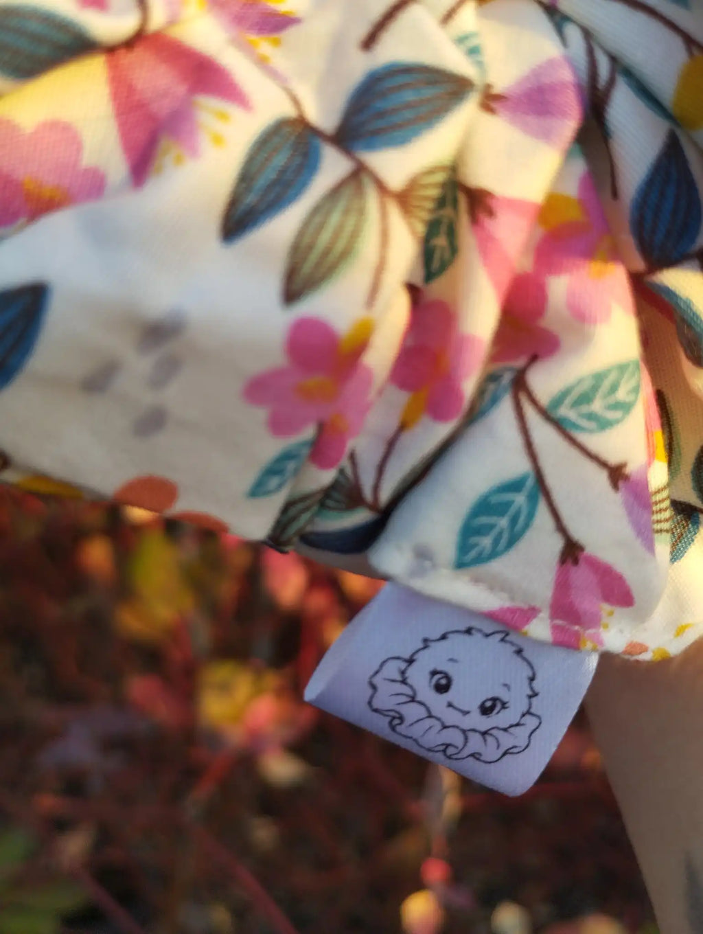 Scrunchlings character label and stitching on Garden Party Jumbo Scrunchie