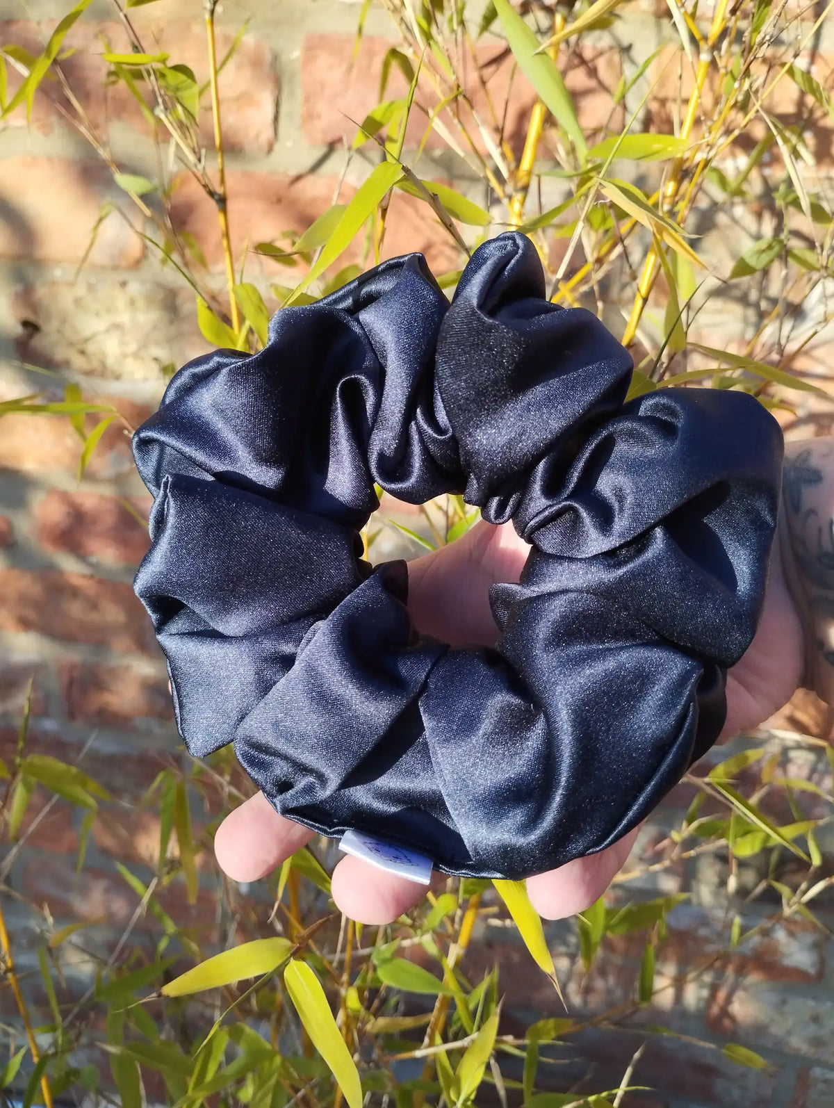Inkwell Dark Navy satin Jumbo scrunchie showing its full gathered shape