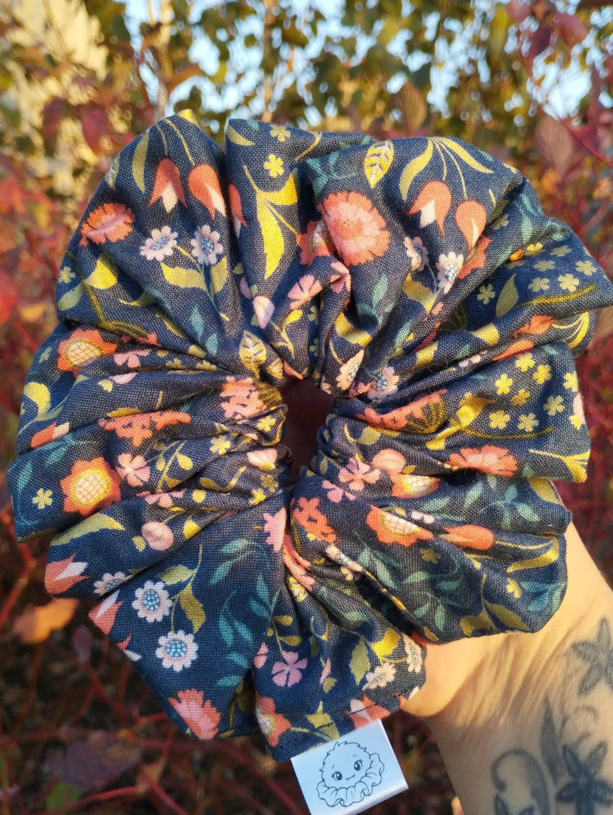 Navy Posy Jumbo Scrunchie, front view showing the gathered shape