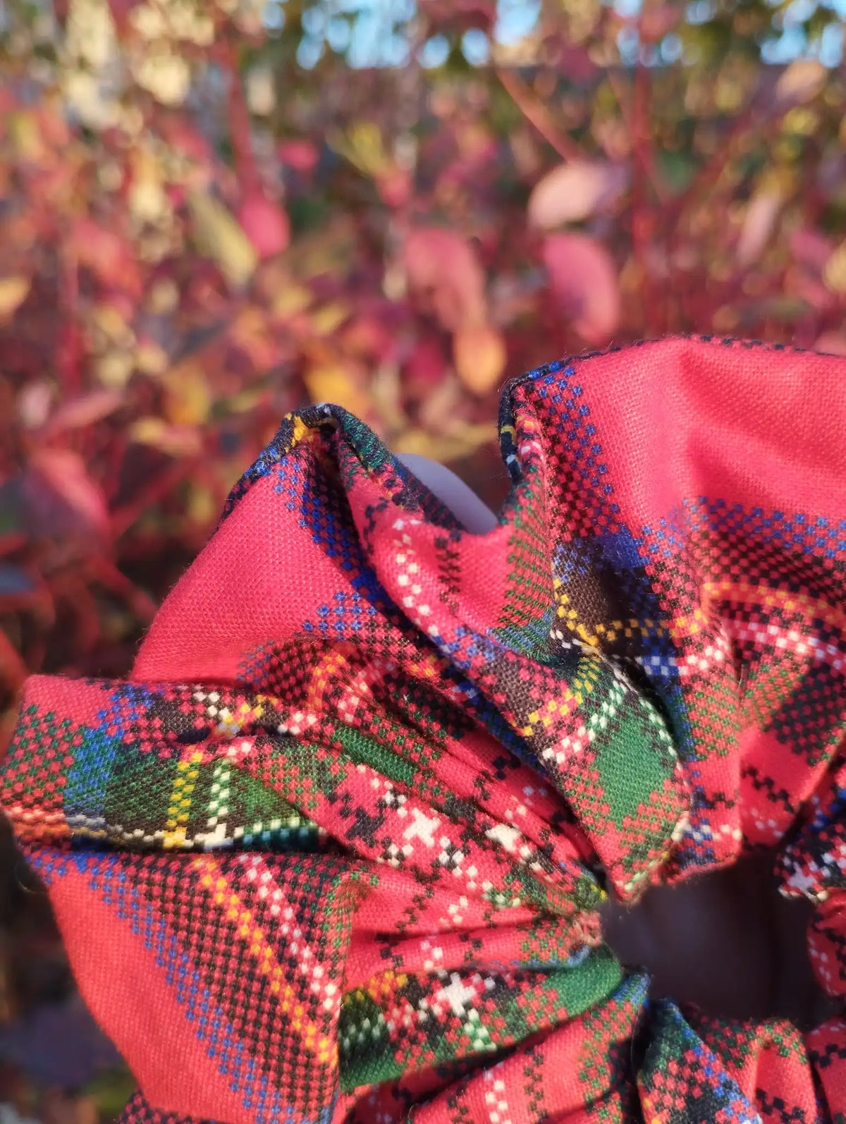 Close-up of the fabric texture and pattern on Red Tartan Jumbo Scrunchie