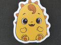 Pebble orange Scrunchlings character sticker