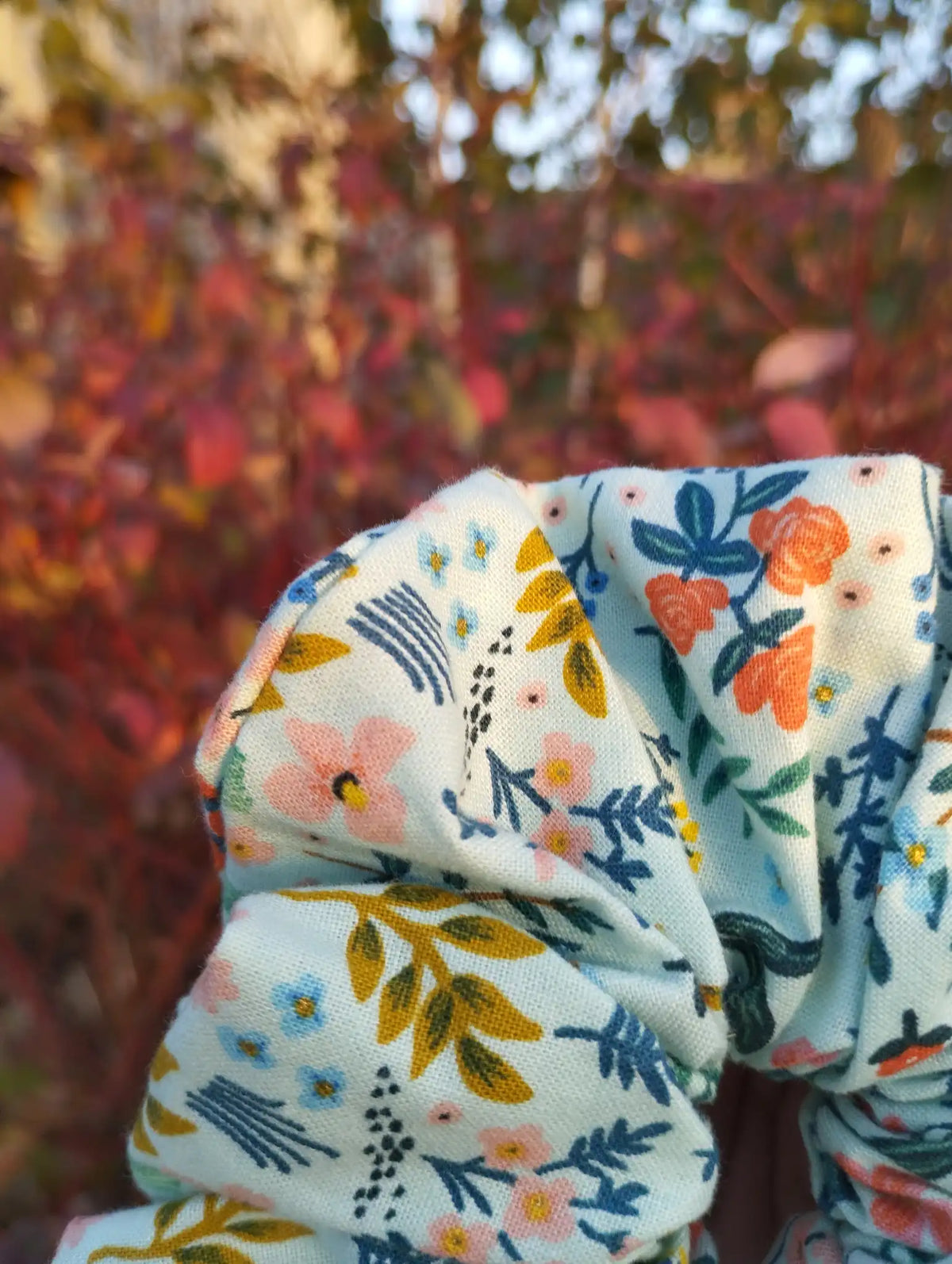 Close-up of the fabric texture and pattern on Soft Meadow Jumbo Scrunchie