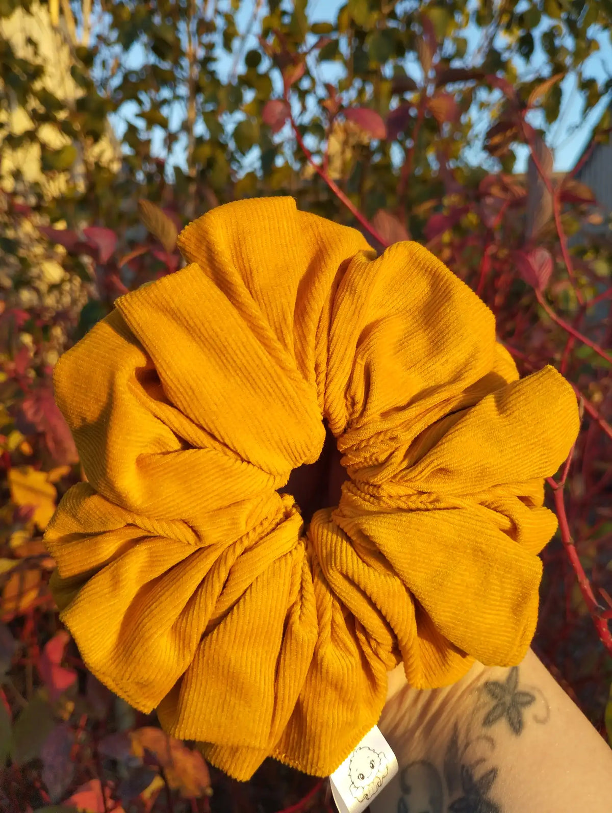 Sunflower Gold Jumbo Scrunchie, front view showing the gathered shape