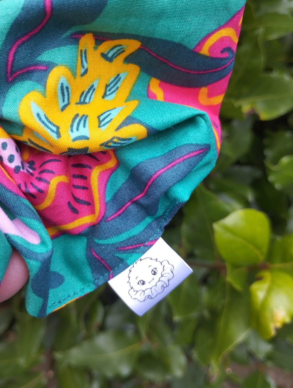 Tropical Bloom floral scrunchie stitching and Scrunchlings character label