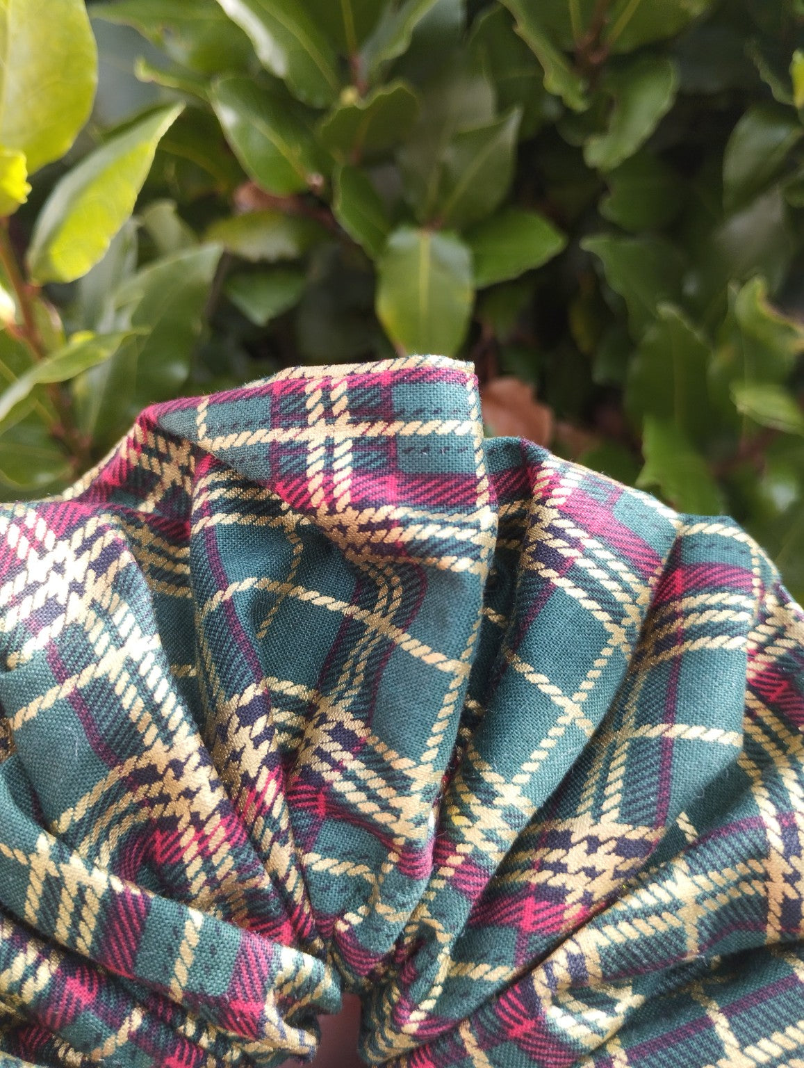 Close-up of green, burgundy and gold-coloured tartan on Woodland Tartan Super Jumbo scrunchie